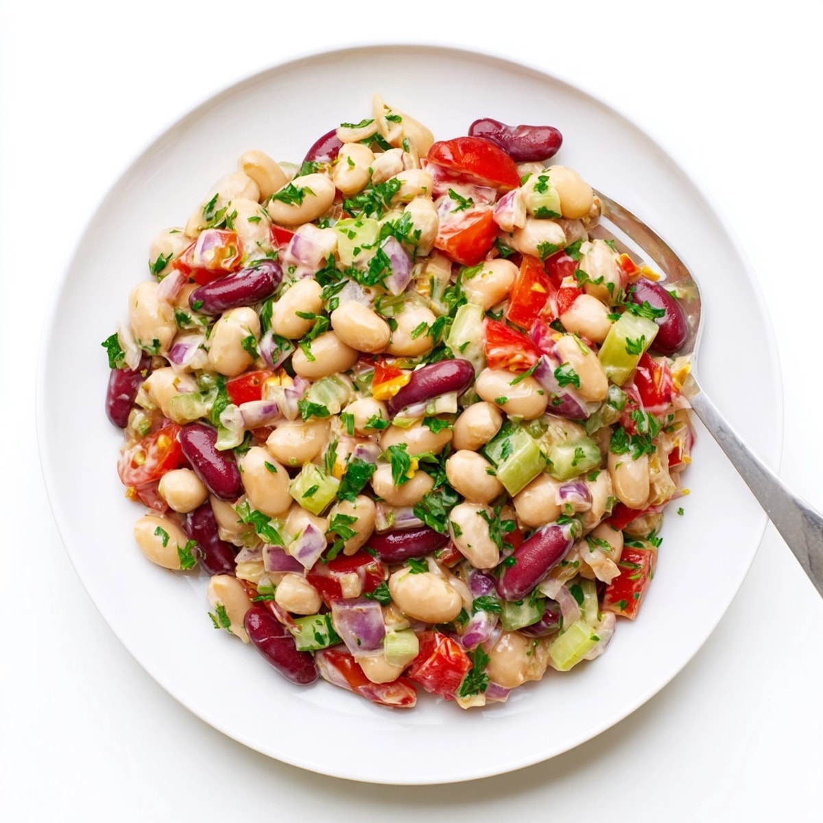 Homemade Creamy Bean Salad, chilled and refreshing, perfect for summer picnics and potlucks.