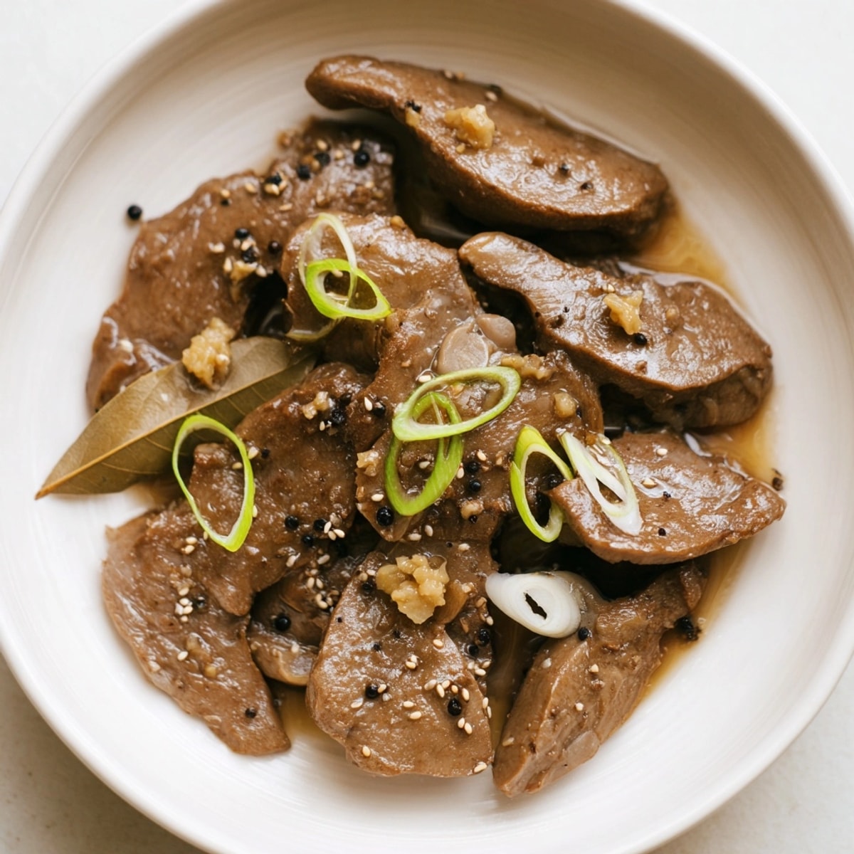 Delicious plate of Adobong Atay ng Manok; aromatic chicken livers in perfectly balanced flavors.
