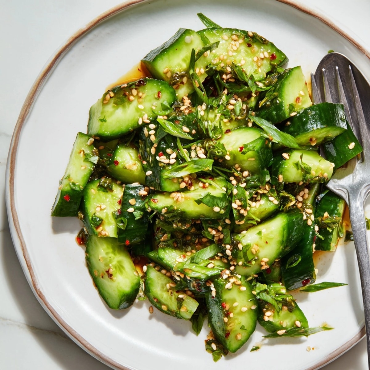 Crisp, juicy Smashed Cucumber Salad, vibrant with herbs and ready to be served immediately.