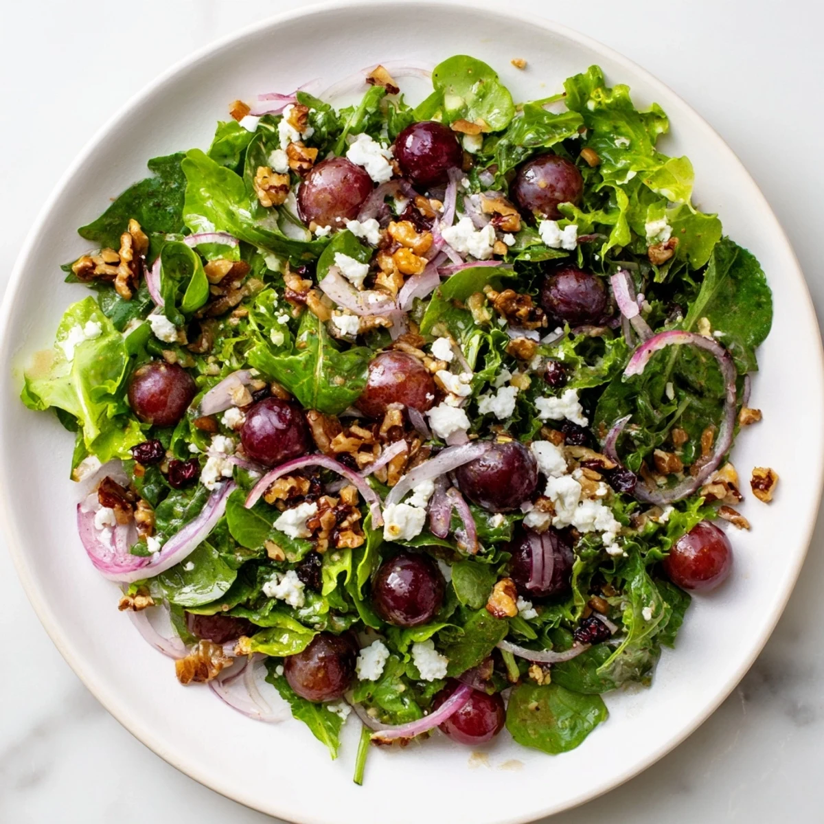 Imagine a beautiful Cranberry Walnut Salad, tossed with tangy dressing, ready to enjoy as lunch.