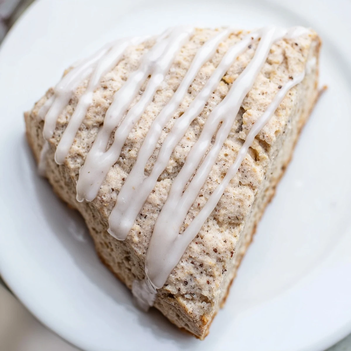 A close-up of fluffy Spiced Chai Latte Scones, showcasing the tender crumb and aromatic spice blend.