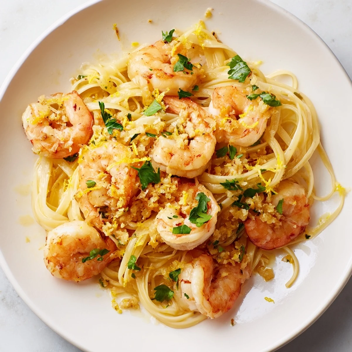 This delicious Lemon Garlic Shrimp Scampi features glistening shrimp coated in a buttery, flavorful sauce.