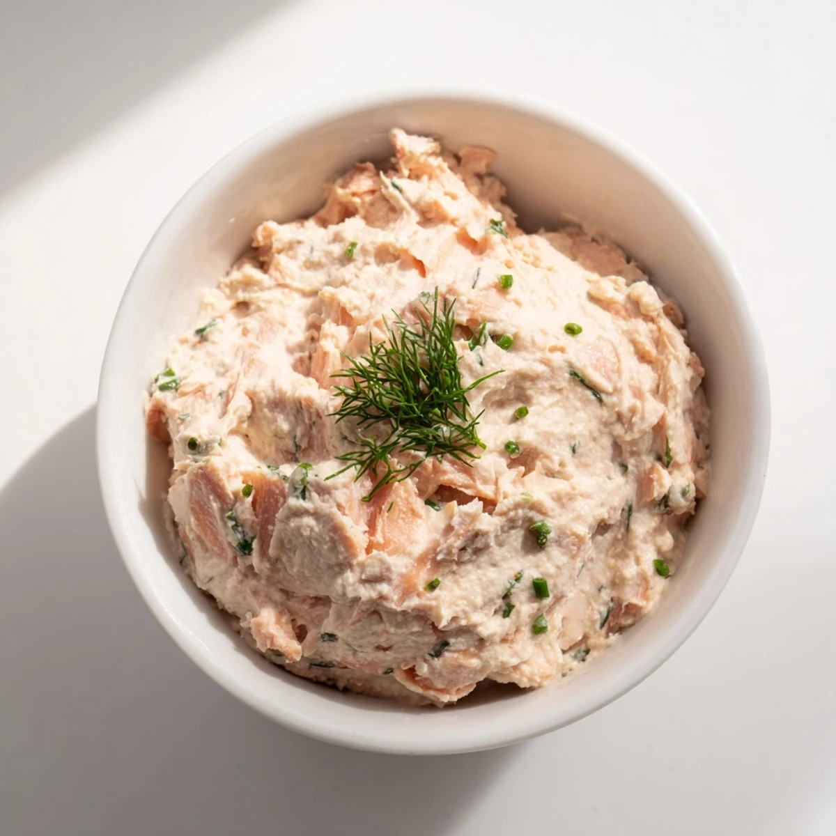 Close-up of smooth, rich Smoked Salmon Pâté garnished, perfect for a dinner party's starters.