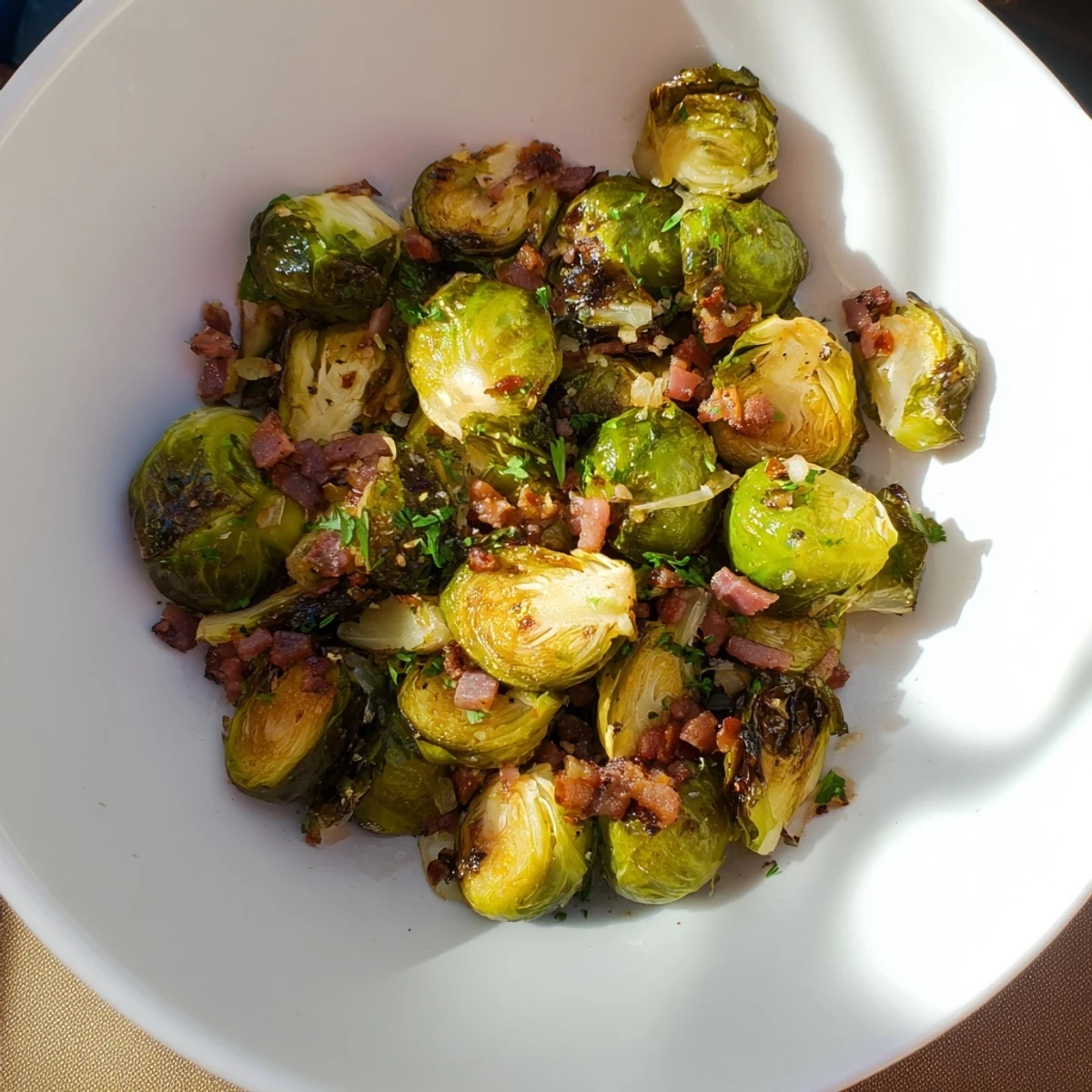Tender-crisp Roasted Brussels Sprouts with Turkey Bacon, drizzled with lemon juice, ready to serve, and enjoy!