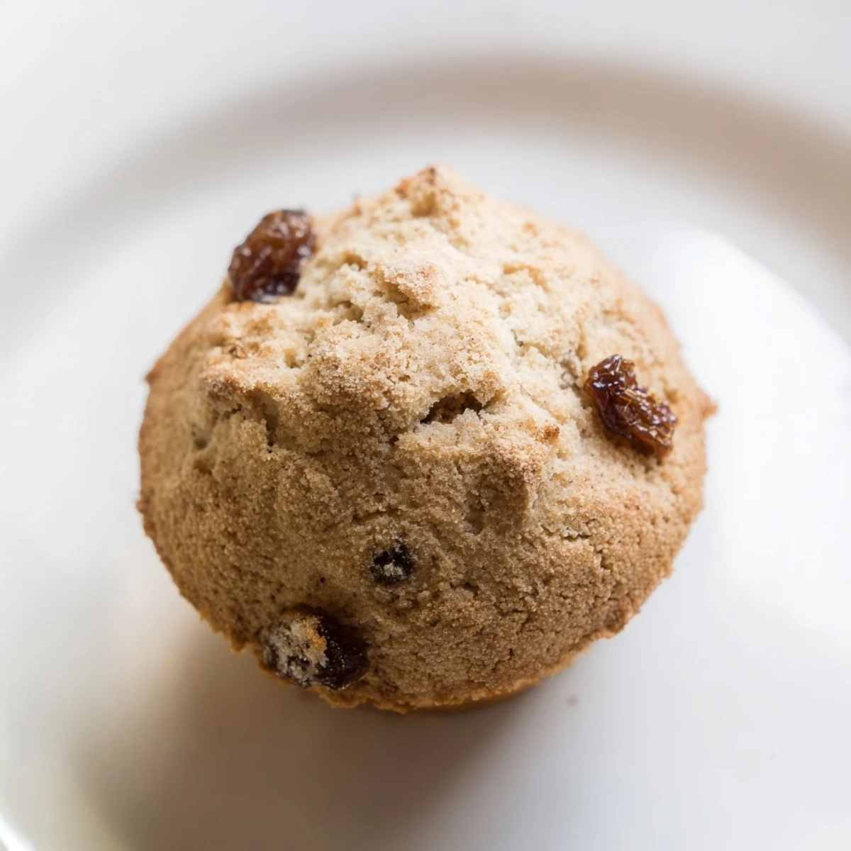 Freshly baked Mini Irish Soda Bread Muffins served warm beside a cup of strong tea.