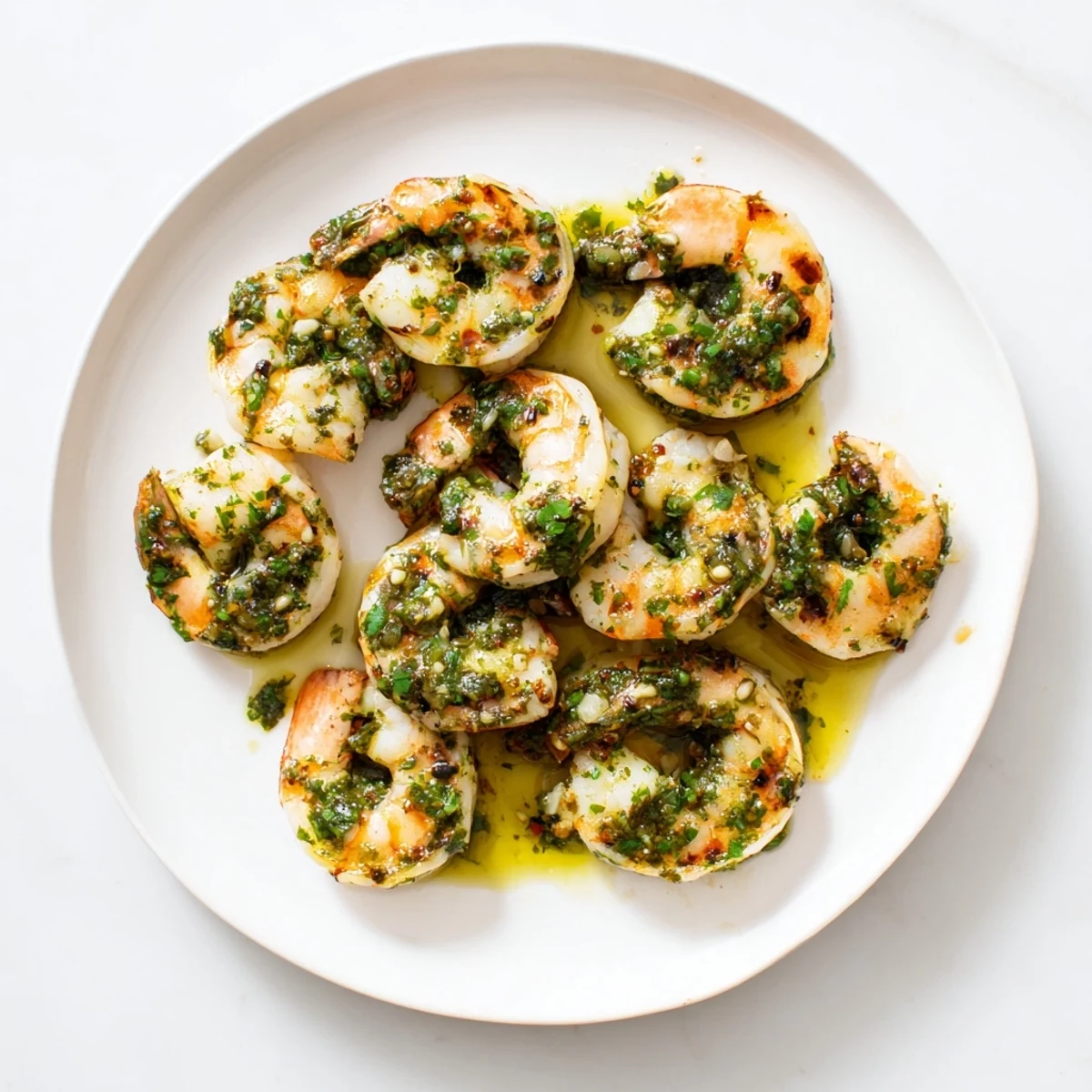 Succulent shrimp cooked in a hot skillet finished with fresh parsley cilantro chimichurri sauce
