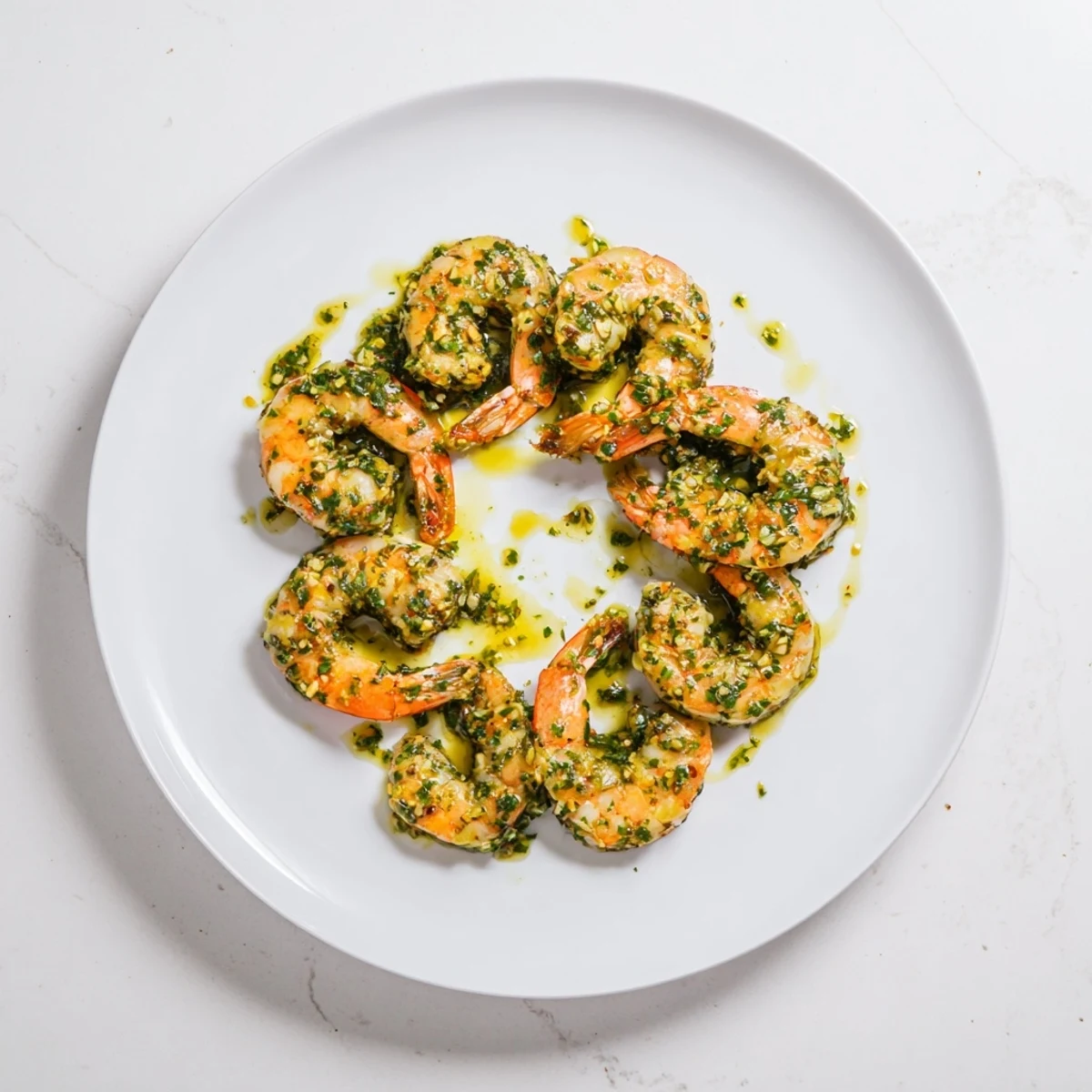Juicy Latin American shrimp tossed with zesty garlic chimichurri sauce ready for dinner