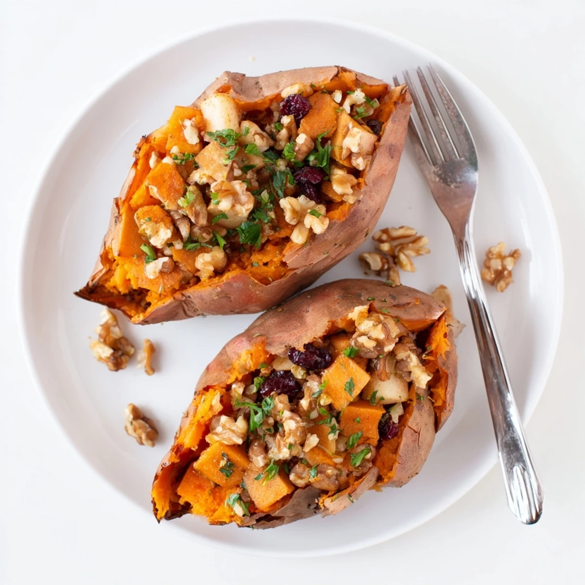 Warm Stuffed Sweet Potatoes With Apples fork fluffed flesh and sweet tart filling