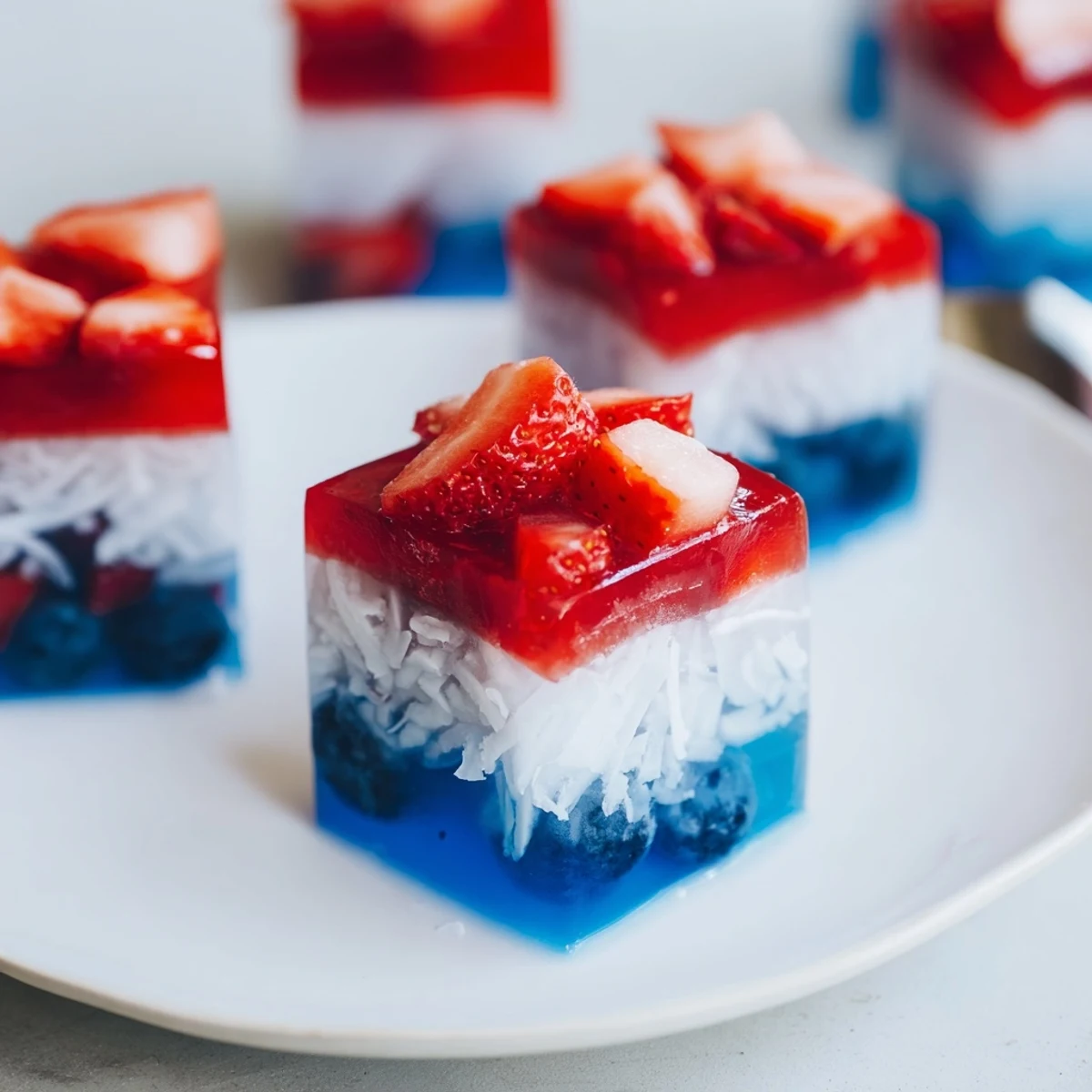Red White And Blue Ice Cubes Recipe displayed in tray, vibrant fruity layers