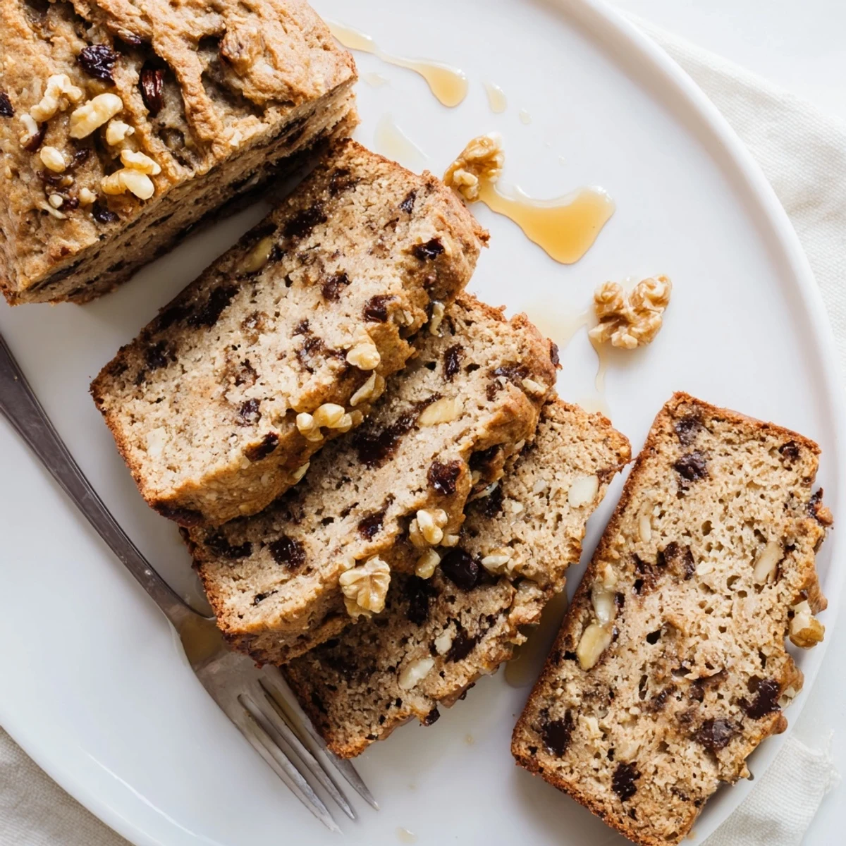 Wholesome protein banana bread oil free cooling on wire rack after baking to golden perfection