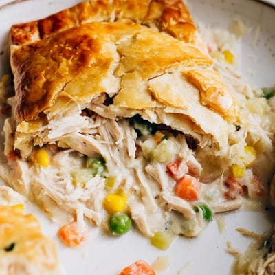 Fresh thyme flavors a comforting Chicken Pie Casserole served steaming hot for a family dinner.